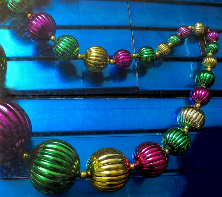 a colorful necklace with beads on it at The  Franklin at Samuels Ave